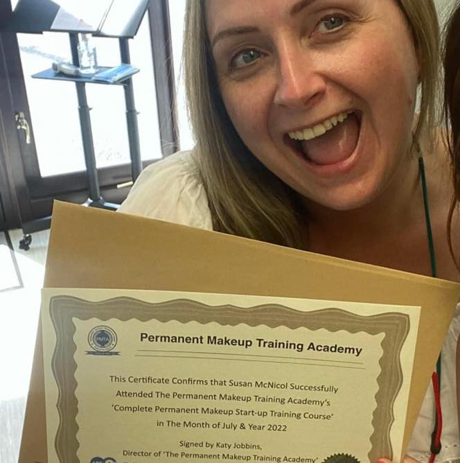 Susan with her final Certificate for Training in Permanent Makeup with Katy Jobbins