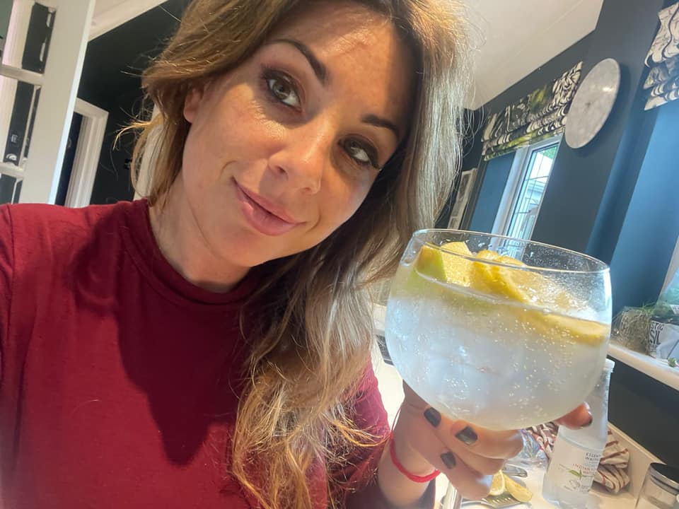 Katy enjoying a well deserved glass of Gin at home