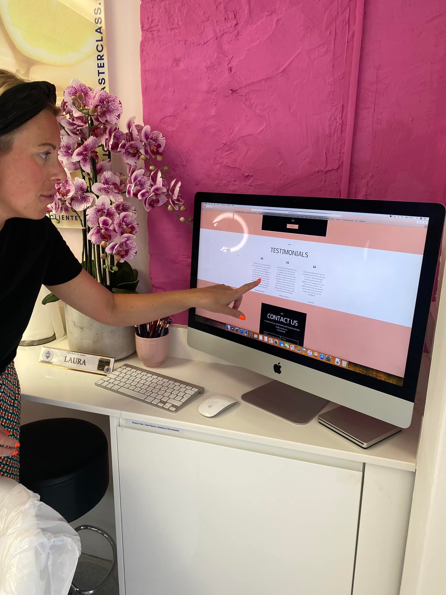 Laura showing off her new website