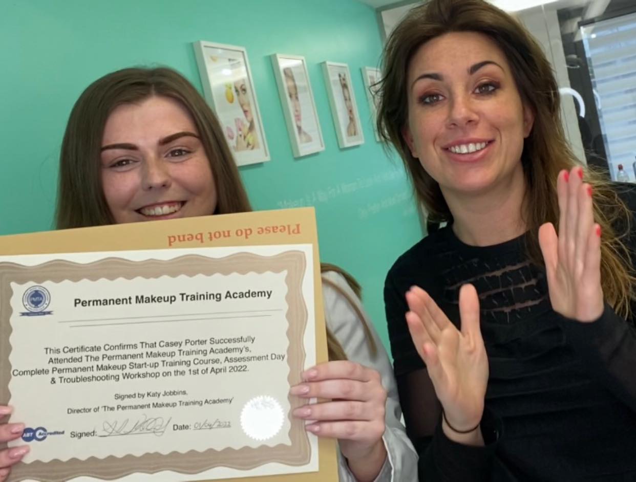 Casey with her permanent makeup training certificate with Katy Jobbins