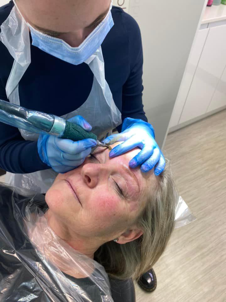 Sara working on a clients brows
