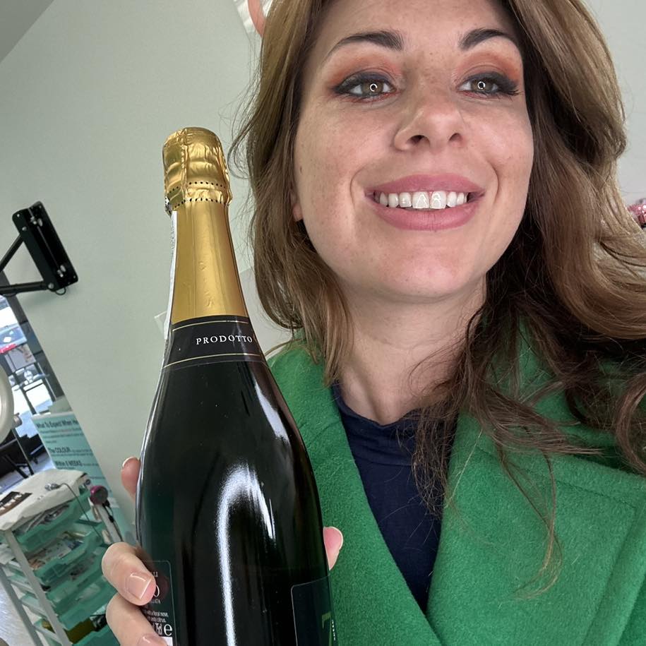 Vikki's champaign gift to Katy Jobbins