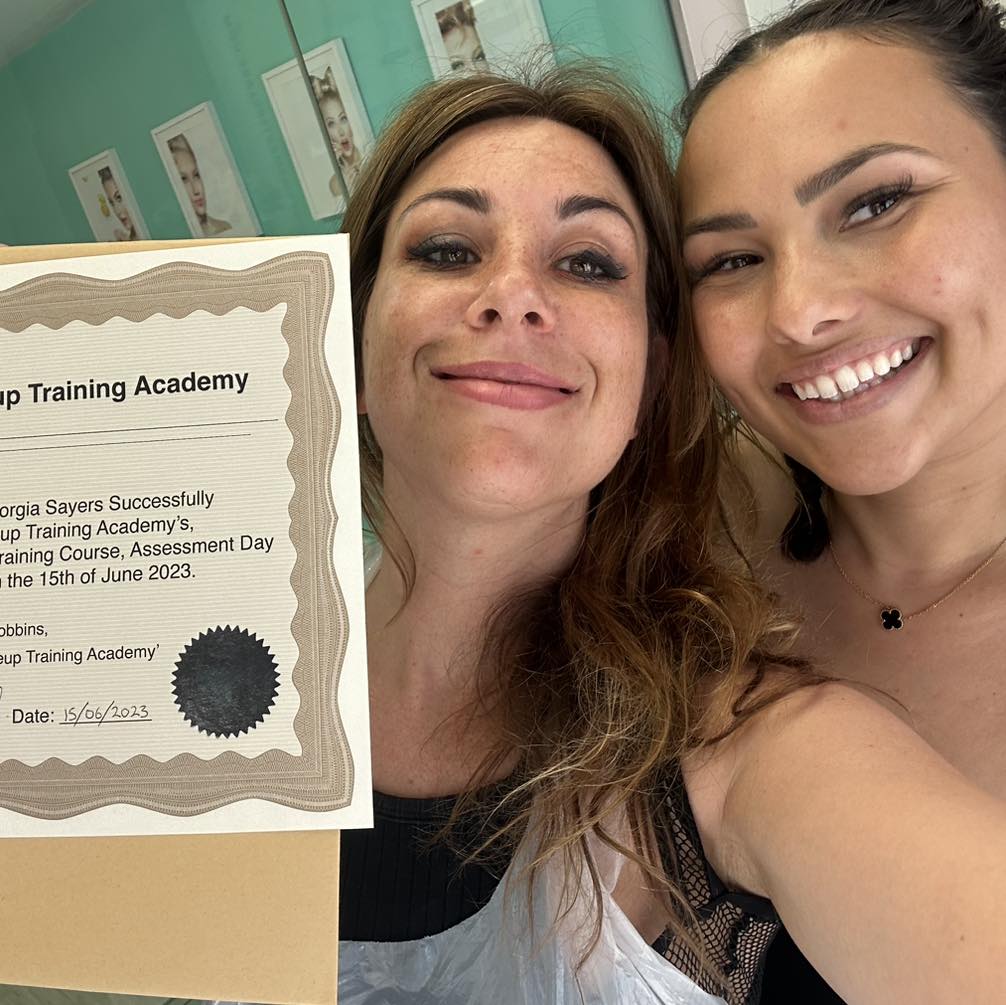Georgia receiving her PMU training certificate from Katy Jobbins