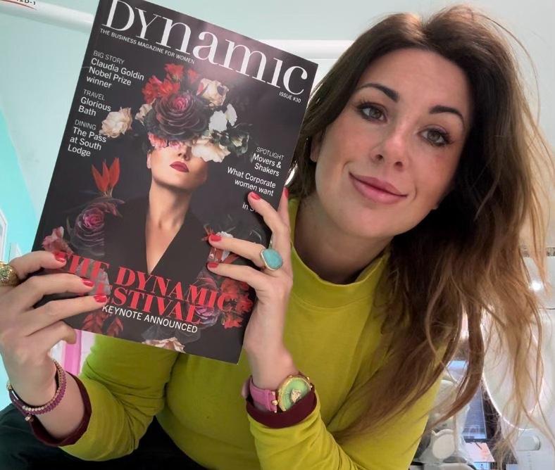Katy holding the Dynamic Business Magazine for Women