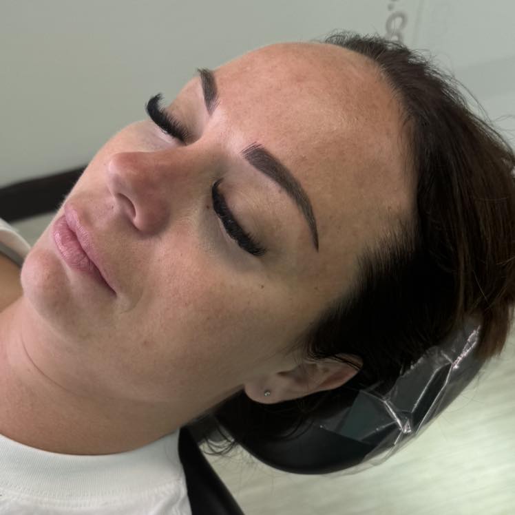 Sarah's client after performing a permanent brow procedure